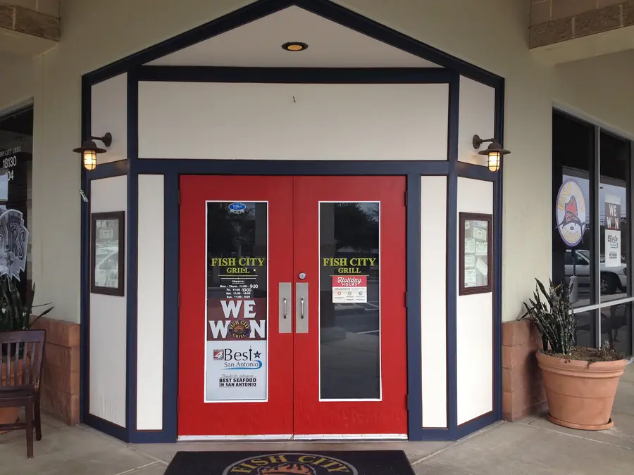 Painted entrance doors, columns and trim at Fish City Grill in San Antonio